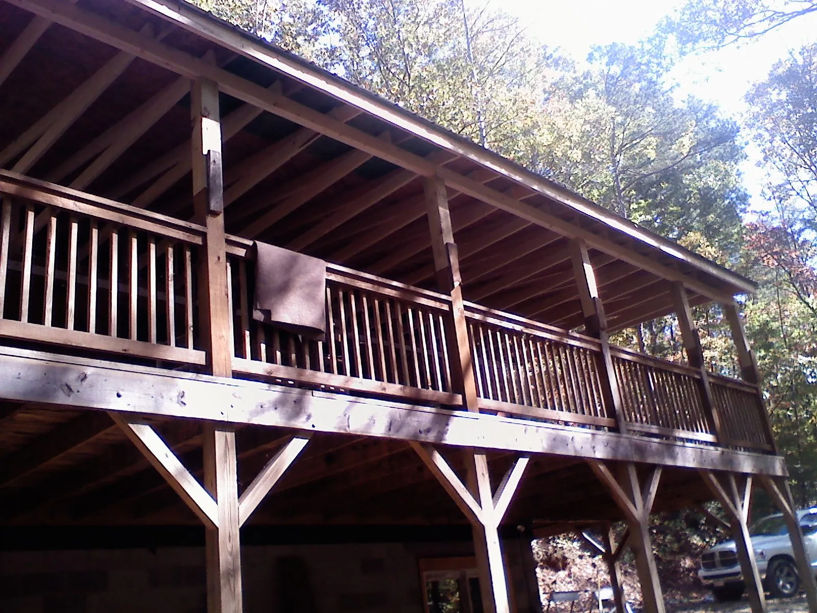 Timber framing under a new elevated porch and deck — Roof Leak Repair in Enola by Roofing Brothers